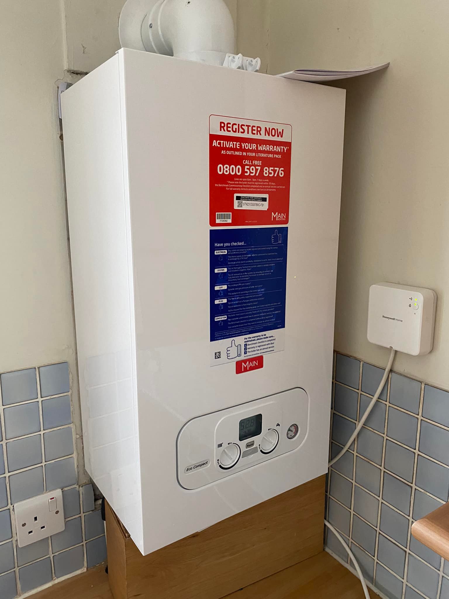 Main Eco Compact boiler E110 fault displayed on control panel – overheating issue guide by Certificates4UK